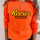 Reeses Peanut Butter Cup Sweatshirt Orange Crewneck for Chocolate Lover Teenager gifts Candy Sweater